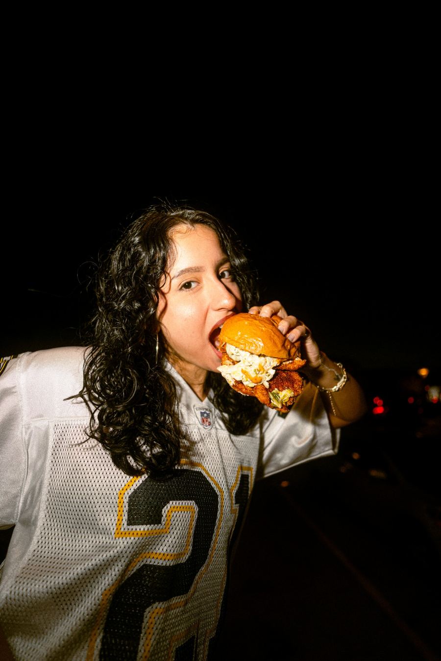 BITE After Dark — hot chicken sandwich, first bite